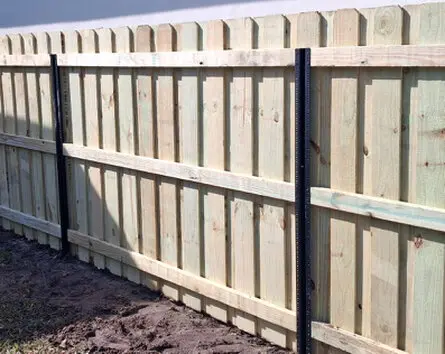 Board on Board Wood Privacy Fence using PostMaster Metal Posts