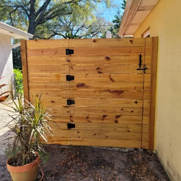 HORIZONTAL BOARD FENCE STAINED NATURAL CEDAR